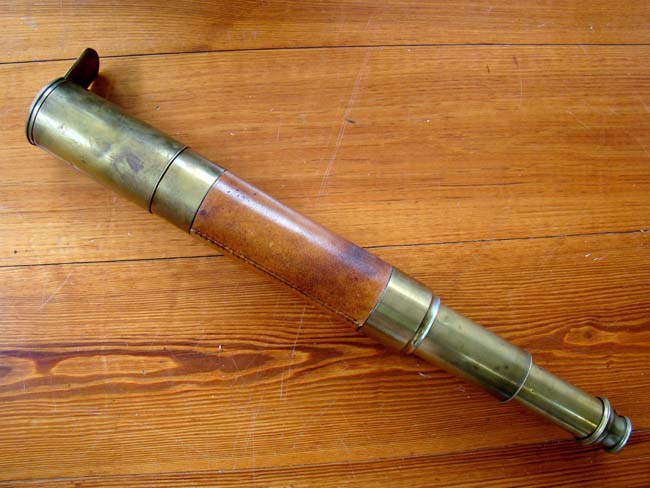 An English two-draw telescope with leather wrapped barrel circa 1840